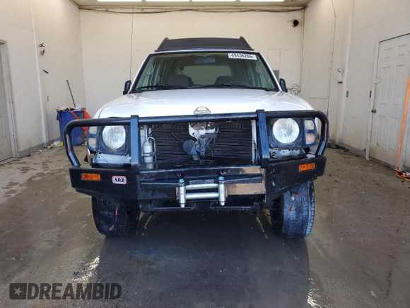 2002 Nissan Xterra XE z VIN 5N1ED28Y62C550414, wystawiony jako Copart lot #49436265 z przebiegiem 234 376 mil mil oraz Szkoda całkowita • Salvage title. Historia ofert i sprzedaży dostępna na DreamBid. Obrazek 5.