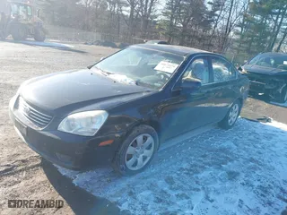 2008 Kia Optima LX with VIN KNAGE123685167925, listed as a IAAI auction lot 41072279 with 168,180 mi miles. Bid and sale history available at carsss.com. Image 2.