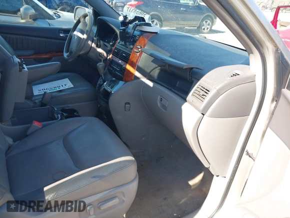 2010 Toyota Sienna XLE with VIN 5TDYK4CC9AS319809, listed as a IAAI auction lot 41885905 with 252,010 mi miles and . Bid and sale history available at DreamBid. Image 5.