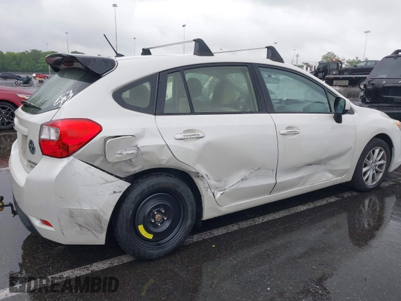 2014 Subaru Impreza Premium z VIN JF1GPAC68E8310797, wystawiony jako IAAI lot #42258193 z przebiegiem 104 260 mil mil oraz . Historia ofert i sprzedaży dostępna na DreamBid. Obrazek 6.