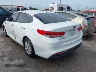 2016 Kia Optima LX with VIN 5XXGT4L31GG041619, listed as a IAAI auction lot 42603879 with 158,755 mi miles and . Bid and sale history available at DreamBid. Image 3.