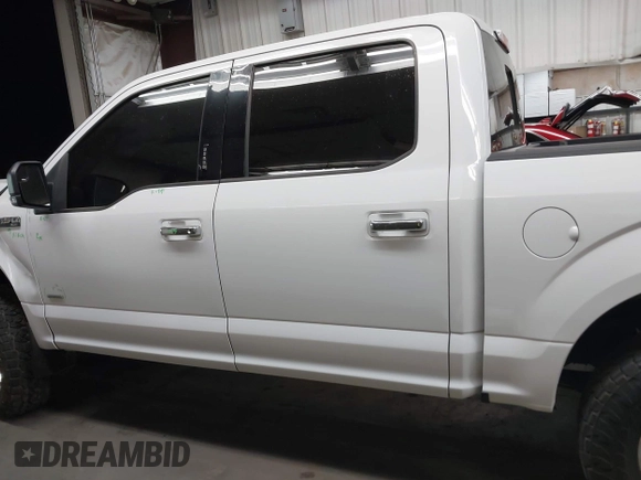 2015 Ford F-150 XLT with VIN 1FTEW1EGXFFB84269, listed as a IAAI auction lot 42565801 with 140,719 mi miles and . Bid and sale history available at DreamBid. Image 14.