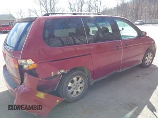 2003 Honda Odyssey EX-L with VIN 5FNRL18923B130410, listed as a IAAI auction lot 41814211 with 209,335 mi miles and . Bid and sale history available at DreamBid. Image 4.