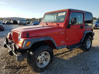 2003 Jeep Wrangler Sport with VIN 1J4FA49S43P332645, listed as a Copart auction lot 77424814 with 165,909 mi miles and Non Repairable. Bid and sale history available at carsss.com. Image 1.