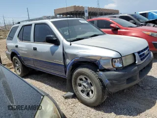 1999 Isuzu Rodeo S with VIN 4S2CK58W2X4361475, listed as a Copart auction lot 63873864 with 232,406 mi miles and Salvage Title. Bid and sale history available at DreamBid. Image 4.