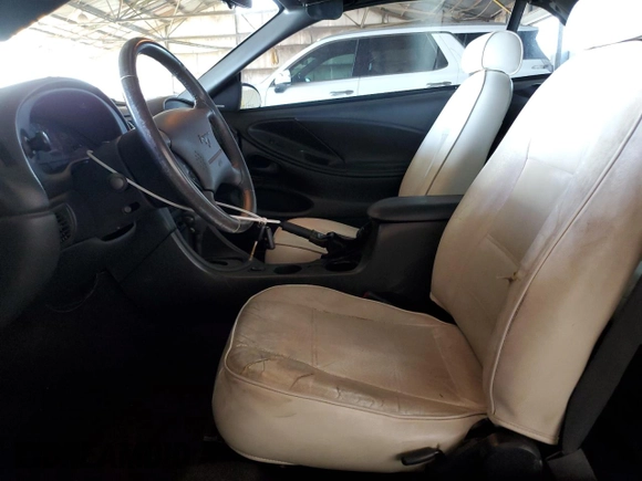 2003 Ford Mustang Deluxe with VIN 1FAFP44403F451821, listed as a Copart auction lot 52860955 with 133,780 mi miles and Clean Title. Bid and sale history available at carsss.com. Image 7.