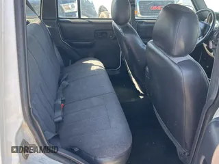 2000 Jeep Cherokee Classic with VIN 1J4FF58S4YL219673, listed as a Copart auction lot 48809075 with 198,334 mi miles and Salvage Title. Bid and sale history available at carsss.com. Image 6.