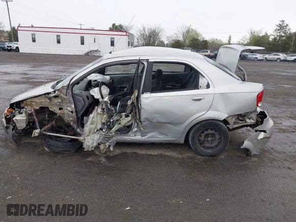 2005 Chevrolet Aveo LS with VIN KL1TD526X5B324267, listed as a IAAI auction lot 41947906 with 180,204 mi miles and . Bid and sale history available at DreamBid. Image 14.