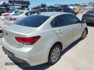 2018 Kia Rio LX with VIN 3KPA24AB2JE137858, listed as a IAAI auction lot 42016321 with 136,728 mi miles. Bid and sale history available at carsss.com. Image 4.
