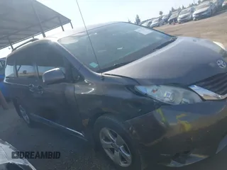 2014 Toyota Sienna LE AAS with VIN 5TDKK3DC0ES498732, listed as a IAAI auction lot 42077044 with 189,745 mi miles and . Bid and sale history available at carsss.com. Image 14.