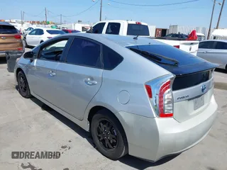 2015 Toyota Prius Four with VIN JTDKN3DU1F1986165, listed as a IAAI auction lot 42281036 with 212,838 mi miles and . Bid and sale history available at DreamBid. Image 3.