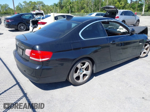 2010 BMW 3 Series 328i with VIN WBAWV1C58AP124385, listed as a IAAI auction lot 41761958 with 197,944 mi miles. Bid and sale history available at carsss.com. Image 4.