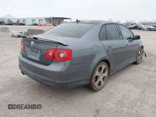 2007 Volkswagen Jetta Sedan GLI 2.0L Turbo with VIN 3VWXJ71K57M095261, listed as a IAAI auction lot 41495424 with 246,772 mi miles. Bid and sale history available at carsss.com. Image 4.