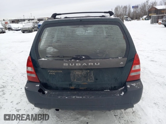 2003 Subaru Forester X with VIN JF1SG63643H749712, listed as a Copart auction lot 77907234 with 166,974 mi miles and Salvage Title. Bid and sale history available at carsss.com. Image 6.