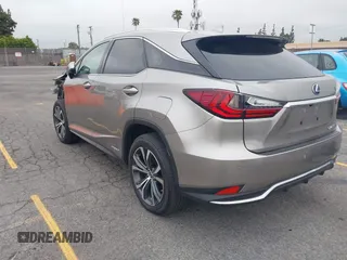 2021 Lexus RX 450h with VIN 2T2HGMDA3MC060208, listed as a IAAI auction lot 42163455 with 34,167 mi miles and . Bid and sale history available at DreamBid. Image 3.