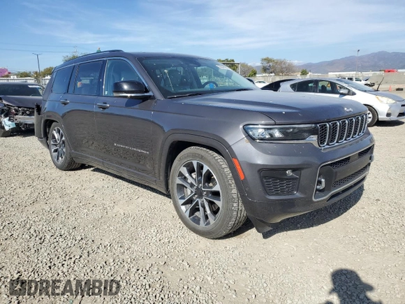 2022 Jeep Grand Cherokee Overland with VIN 1C4RJKDG2N8536125, listed as a Copart auction lot 50843965 with 70,865 mi miles and Salvage title. Bid and sale history available at DreamBid. Image 4.
