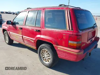 1993 Jeep Grand Cherokee Limited with VIN 1J4GZ78Y1PC566288, listed as a IAAI auction lot 41677921 with 73,490 mi miles. Bid and sale history available at carsss.com. Image 3.
