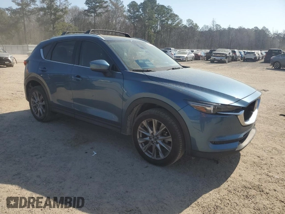 2021 Mazda CX-5 Grand Touring with VIN JM3KFADM0M0391349, listed as a Copart auction lot 48886685 with 38,923 mi miles and Clean Title. Bid and sale history available at carsss.com. Image 4.