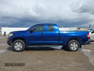 2014 Toyota Tundra SR with VIN 5TFUM5F17EX056082, listed as a IAAI auction lot 41884095 with 155,036 mi miles and . Bid and sale history available at DreamBid. Image 14.