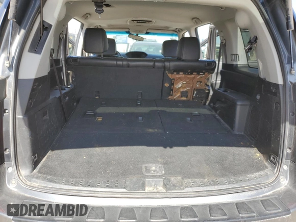 2012 Honda Pilot Touring with VIN 5FNYF4H9XCB084796, listed as a Copart auction lot 49319735 with 184,639 mi miles and Salvage Title. Bid and sale history available at DreamBid. Image 6.
