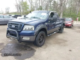 2004 Ford F-150 XLT with VIN 1FTPX145X4NA82267, listed as a IAAI auction lot 42007692 with 295,040 mi miles and . Bid and sale history available at carsss.com. Image 2.