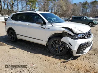 2023 Volkswagen Tiguan SE R-Line Black with VIN 3VVCB7AX6PM001044, listed as a Copart auction lot 47365565 with 20,059 mi miles and Salvage title. Bid and sale history available at DreamBid. Image 4.