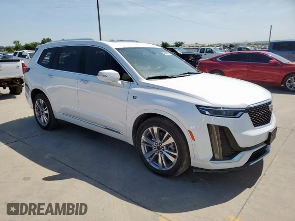 2024 Cadillac XT6 FWD Premium Luxury with VIN 1GYKPCRS7RZ711983, listed as a Copart auction lot 64842625 with 6,394 mi miles and Clean title. Bid and sale history available at DreamBid. Image 4.