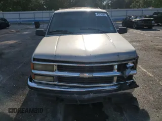 1999 Chevrolet Suburban with VIN 1GNEC16R9XJ490863, listed as a Copart auction lot 65938594 with 176,391 mi miles and Salvage Title. Bid and sale history available at carsss.com. Image 5.
