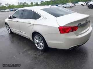 2014 Chevrolet Impala LTZ with VIN 1G1155S38EU105260, listed as a IAAI auction lot 42012082 with 230,407 mi miles. Bid and sale history available at carsss.com. Image 3.