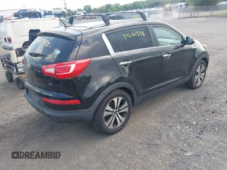 2013 Kia Sportage EX with VIN KNDPCCA23D7427564, listed as a IAAI auction lot 42681328 with 111,963 mi miles and . Bid and sale history available at DreamBid. Image 4.