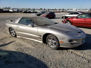 1999 Pontiac Firebird Formula with VIN 2G2FV22G3X2206170, listed as a Copart auction lot 74780914 with Not provided miles and Salvage title. Bid and sale history available at DreamBid. Image 4.