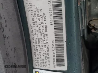 2004 Volkswagen Passat GLX z VIN WVWRH63B44P205575, wystawiony jako Copart lot #71710354 z przebiegiem 187 872 mil mil oraz Czysty tytuł • Clean title. Historia ofert i sprzedaży dostępna na DreamBid. Obrazek 12.
