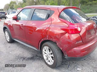 2014 Nissan Juke S with VIN JN8AF5MV7ET484233, listed as a IAAI auction lot 42146327 with 106,477 mi miles and . Bid and sale history available at carsss.com. Image 3.