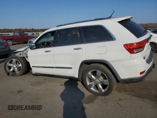 2013 Jeep Grand Cherokee Overland with VIN 1C4RJFCG8DC639408, listed as a Copart auction lot 77910444 with 89,623 mi miles and Salvage Title. Bid and sale history available at carsss.com. Image 2.