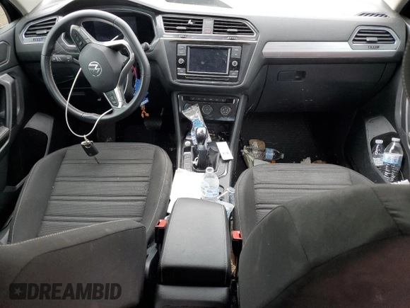 2023 Volkswagen Tiguan S with VIN 3VVRB7AX0PM038326, listed as a Copart auction lot 56350825 with 50,013 mi miles and Salvage title. Bid and sale history available at DreamBid. Image 8.