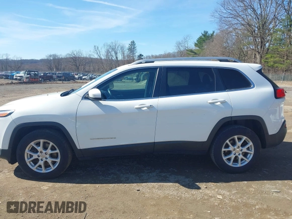 2015 Jeep Cherokee Latitude with VIN 1C4PJMCS8FW624375, listed as a IAAI auction lot 41848679 with 148,130 mi miles and . Bid and sale history available at DreamBid. Image 14.
