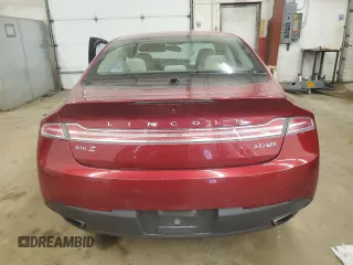 2015 Lincoln MKZ z VIN 3LN6L2J92FR624638, wystawiony jako Copart lot #57158245 z przebiegiem 150 045 mil mil oraz Szkoda całkowita • Salvage title. Historia ofert i sprzedaży dostępna na DreamBid. Obrazek 6.