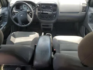 2003 Ford Escape XLS Popular with VIN 1FMYU92163KC43110, listed as a Copart auction lot 58699684 with 66,450 mi miles and Salvage Title. Bid and sale history available at carsss.com. Image 8.