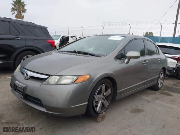 2007 Honda Civic Sdn EX with VIN 1HGFA16867L087102, listed as a IAAI auction lot 42021975 with 174,215 mi miles. Bid and sale history available at carsss.com. Image 2.