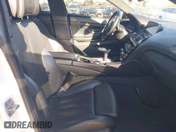 2016 BMW 6 Series 640i xDrive with VIN WBA6D2C51GGT66209, listed as a IAAI auction lot 42064405 with 113,500 mi miles and . Bid and sale history available at carsss.com. Image 5.
