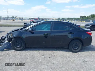 2019 Toyota Corolla L z VIN 5YFBURHE1KP865263, wystawiony jako IAAI lot #42153766 z przebiegiem 62 827 mil mil oraz . Historia ofert i sprzedaży dostępna na DreamBid. Obrazek 14.
