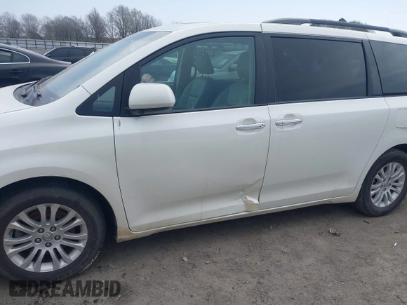 2017 Toyota Sienna XLE Auto Access Seat with VIN 5TDYZ3DC2HS793132, listed as a IAAI auction lot 41769803 with 145,112 mi miles and . Bid and sale history available at DreamBid. Image 6.