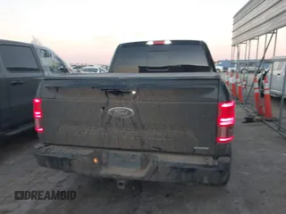 2019 Ford F-150 XL with VIN 1FTEW1E45KKC47947, listed as a IAAI auction lot 41078136 with 121,489 mi miles. Bid and sale history available at carsss.com. Image 16.
