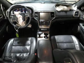 2015 Jeep Grand Cherokee Summit z VIN 1C4RJFJG1FC628532, wystawiony jako Copart lot #52546755 z przebiegiem 107 700 mil mil oraz Szkoda całkowita • Salvage title. Historia ofert i sprzedaży dostępna na DreamBid. Obrazek 8.