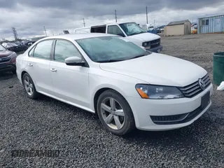 2013 Volkswagen Passat Wolfsburg Edition with VIN 1VWAP7A39DC132046, listed as a IAAI auction lot 41829115 with 122,660 mi miles. Bid and sale history available at carsss.com. Image 1.