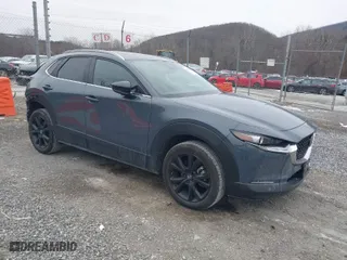 2023 Mazda CX-30 2.5 S Carbon Edition with VIN 3MVDMBCM8PM584296, listed as a IAAI auction lot 41390814 with 19,959 mi miles. Bid and sale history available at carsss.com. Image 1.