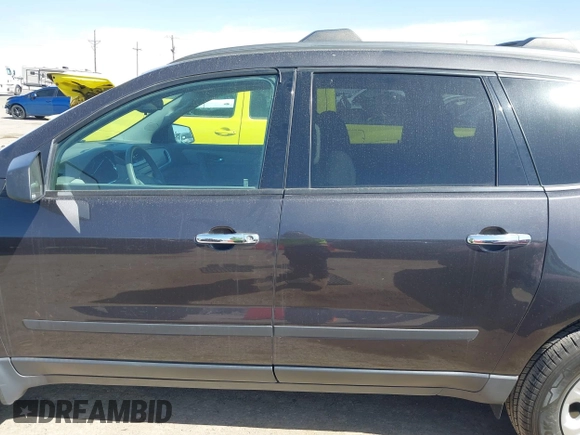 2015 Chevrolet Traverse LS z VIN 1GNKVFED7FJ203566, wystawiony jako IAAI lot #41783373 z przebiegiem 147 309 mil mil oraz . Historia ofert i sprzedaży dostępna na DreamBid. Obrazek 14.