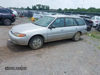 1997 Ford Escort LX z VIN 3FALP15PXVR164048, wystawiony jako IAAI lot #42401563 z przebiegiem 177 024 mil mil oraz . Historia ofert i sprzedaży dostępna na DreamBid. Obrazek 2.