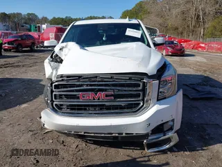 2019 GMC Yukon SLT with VIN 1GKS2BKC9KR166896, listed as a IAAI auction lot 41429865 with 165,174 mi miles. Bid and sale history available at carsss.com. Image 12.