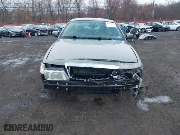 2003 Mercury Grand Marquis LS Premium with VIN 2MEFM75WX3X634344, listed as a IAAI auction lot 41888397 with 129,651 mi miles and . Bid and sale history available at DreamBid. Image 12.
